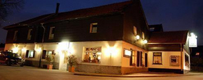 Отель Hotel Garni Haus Schönberger  Хайлигенхаус